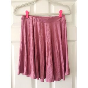 Flowy pink mini skirt.